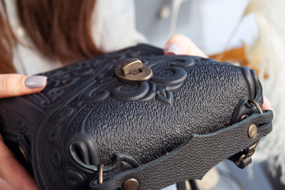 Small Black Leather Crossbody Backpack with Boho Ornament