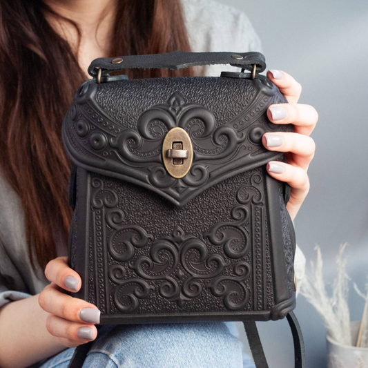 Small Black Leather Crossbody Backpack with Boho Ornament