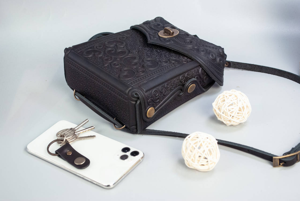 Small Black Leather Crossbody Backpack with Boho Ornament