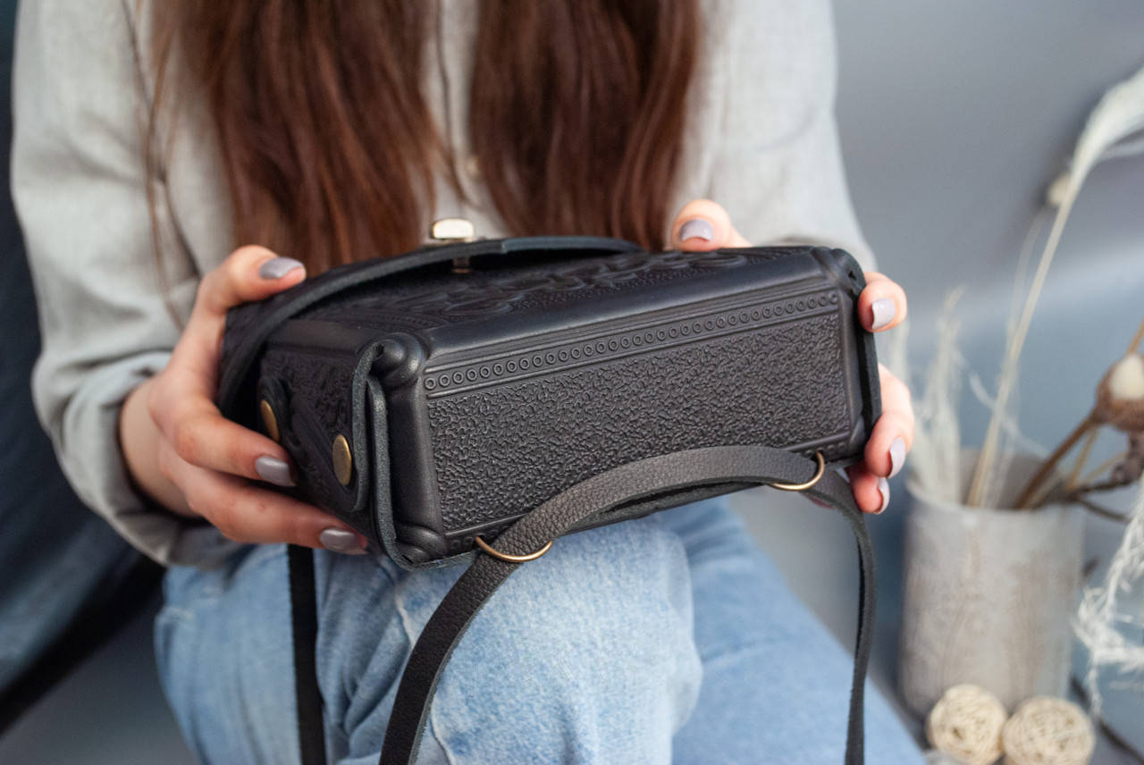 Small Black Leather Crossbody Backpack with Boho Ornament